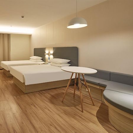 Hanting Hotel Qingdao Zhanqiao Railway Station Экстерьер фото