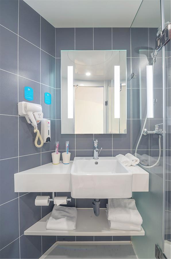 Hanting Hotel Qingdao Zhanqiao Railway Station Экстерьер фото