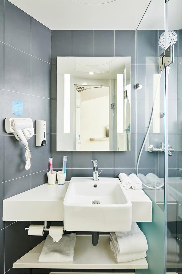 Hanting Hotel Qingdao Zhanqiao Railway Station Экстерьер фото